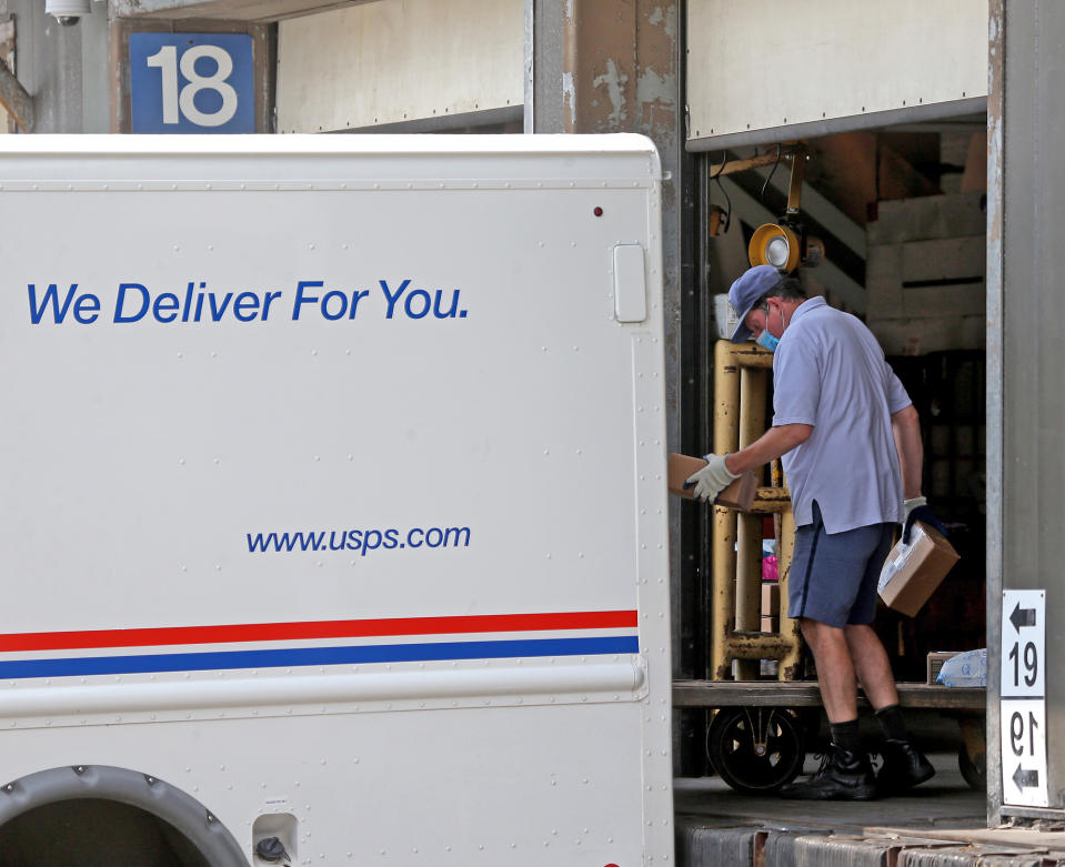 BOSTON, MA. - AUGUST 11 A post office worker loads his truck at the United States Post Office annex on August 11, 2020 in Boston, Massachusetts.   (Staff Photo By Matt Stone/ MediaNews Group/Boston Herald)