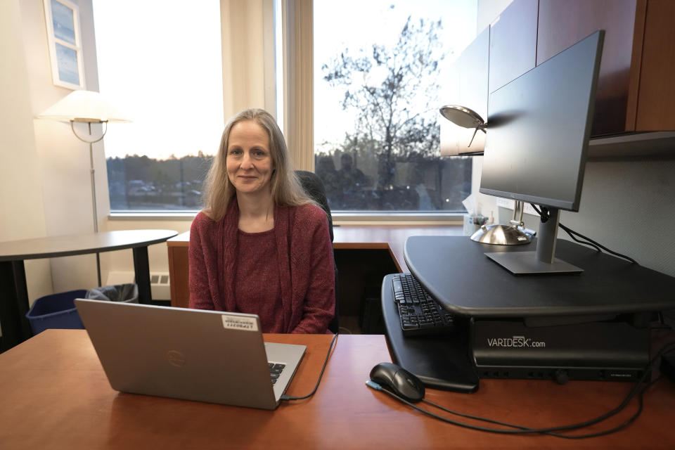 Kara Zivin, a University of Michigan professor of psychiatry, obstetrics and gynecology, and health management, sits in her office in Ann Arbor, Mich., Monday, Nov. 7, 2022. Zivin co-authored a study published in 2021 that found that suicidal thoughts and behavior among commercially insured U.S. individuals before, during and after pregnancy were rising. The rates were low, but they increased among those with anxiety or depression from 1 per 10,000 in 2006 to almost 3 per 10,000 in 2017. (AP Photo/Paul Sancya)