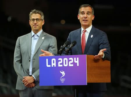 Los Angeles Mayor Eric Garcetti speaks along with LA 2024 Chairman Casey Wasserman during a news conference following three days of meetings and tours with the International Olympic Committee (IOC) Evaluation Commission as part of LA 2024's bid for the Summer 2024 Olympic Games in Los Angeles, California, U.S., May 12, 2017. REUTERS/Mike Blake