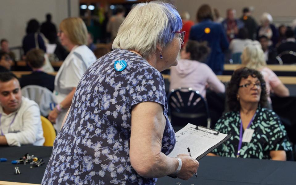 A volunteer oversees the ballot count following the close of voting in the UK general election on July 4, 2024 in Chessington, England