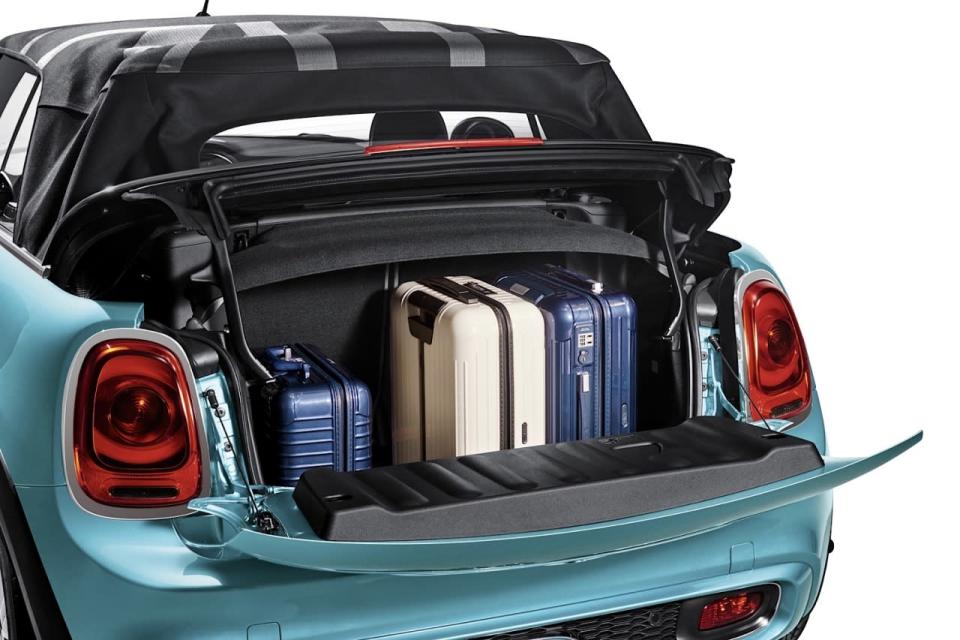 <p>The good news is that said luggage space is highly accessible, thanks to a flip-down tailgate (which can support 176 pounds) and a top stack that flips up a few inches to facilitate access. The rear seats also fold 50/50, should you have larger items to carry.</p>