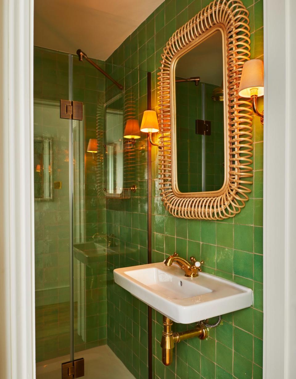 An AM/PM mirror adds fun to this east London bathroom (Astrid Templier)