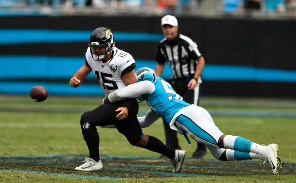 Carolina Panthers linebacker Brian Burns (53) strip-sacks Jacksonville Jaguars quarterback Gardner Minshew (15) in the fourth quarter at Bank of America Stadium in Charlotte, NC on Sunday, October 6, 2019. The Panthers won, 34-27.