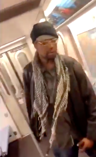 Man kicks elderly woman on New York City subway train
