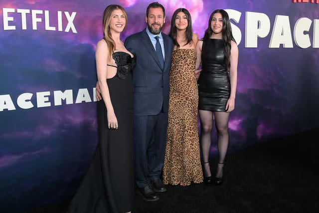 <p>Charley Gallay/Getty </p> Jackie Sandler, Adam Sandler, Sunny Sandler, and Sadie Sandler attend the 'Spaceman' screening in L.A.