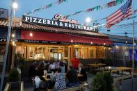 People gather to eat at Palermo Pizzeria and Restaurant on Staten Island in New York City