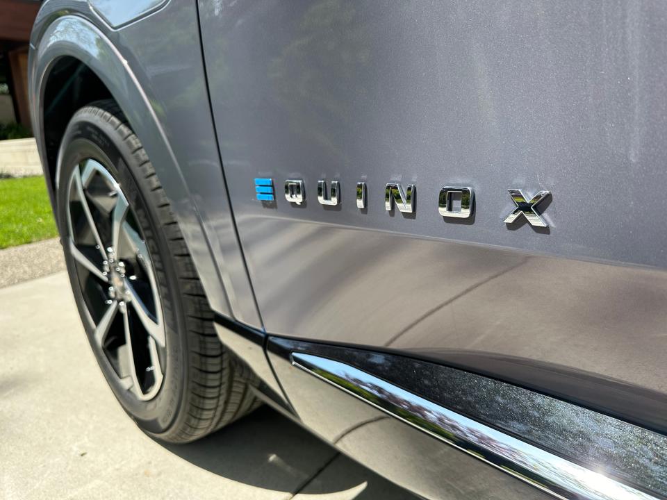 A close-up of the Chevrolet Equinox EV badge