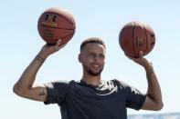 Golden State Warriors NBA basketball player Stephen Curry is filmed for an Infiniti car advertisement in Blackhawk, California, U.S. June 26, 2017. REUTERS/Kate Munsch