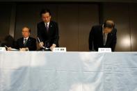 Toshiba Corp incoming President and chief executive Satoshi Tsunakawa (L) prepares for leave a news conference with incoming chairman Shigenori Shiga and outgoing President and CEO Masashi Muromachi (R), at the company headquarters in Tokyo, Japan May 6, 2016. REUTERS/Issei Kato