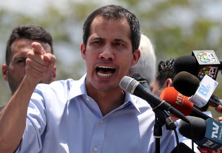 FILE PHOTO: Venezuelan opposition leader Juan Guaido, who many nations have recognised as the country's rightful interim ruler, speaks at a rally against the government of Venezuela's President Nicolas Maduro in Guatire, Venezuela May 18, 2019. REUTERS/Ivan Alvarado/File Photo