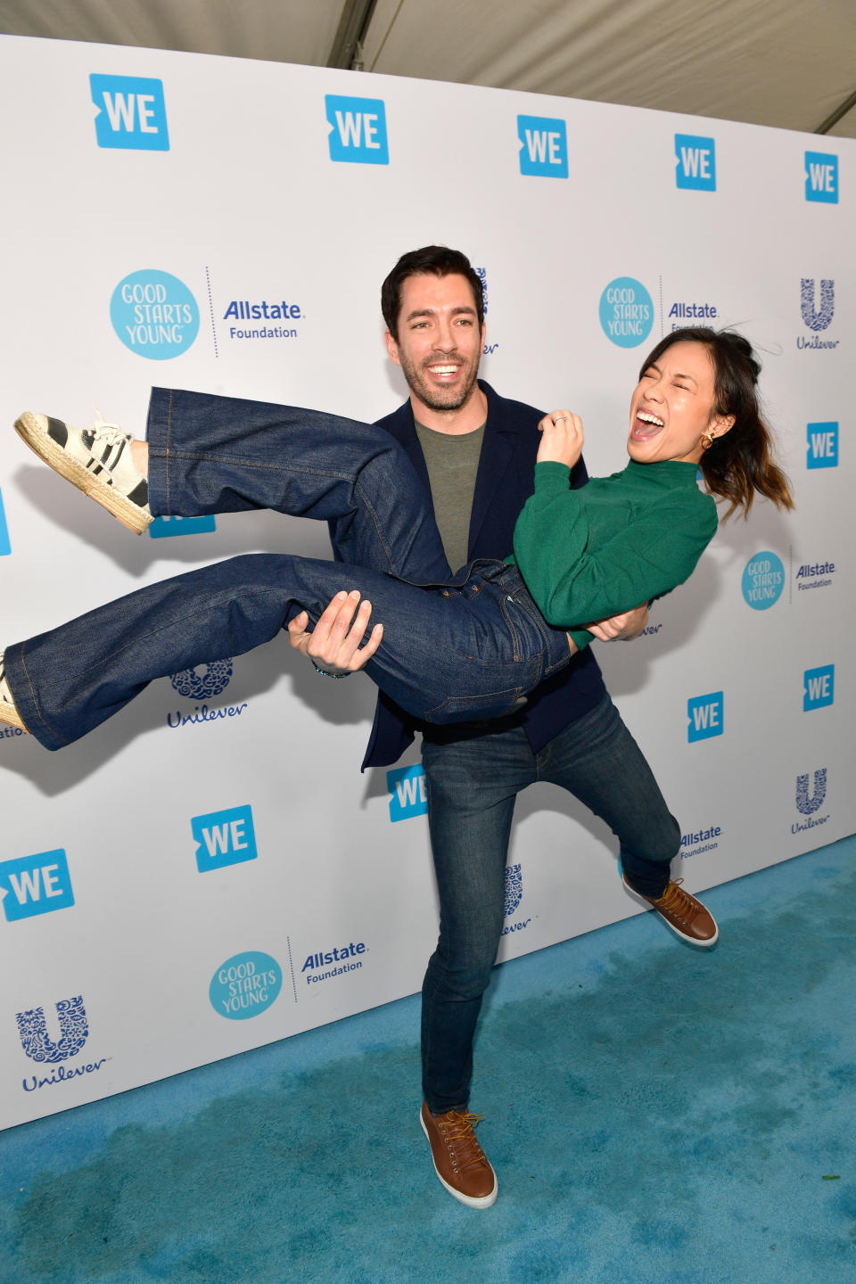 INGLEWOOD, CA - APRIL 19:  Drew Scott (L) and Linda Phan attend WE Day California at The Forum on April 19, 2018 in Inglewood, California.  (Photo by Matt Winkelmeyer/Getty Images)