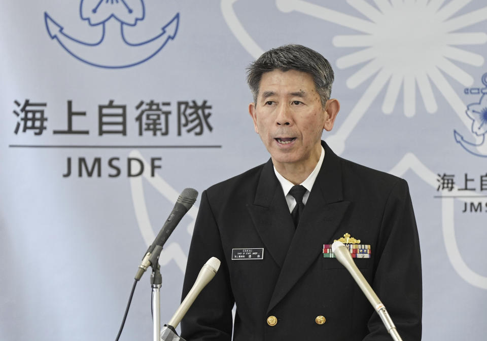 Japanese navy chief of staff Ryo Sakai speaks during a press conference at Defense Ministry in Tokyo Sunday, April 21, 2024. Initial analysis of flight data recorders recovered from the waters in the Pacific near the crash site of the two Japanese navy helicopters showed no sign that mechanical problems in the aircraft caused the accident, Japan’s defense minister said Monday, as he indicated human error. (Kyodo News via AP)