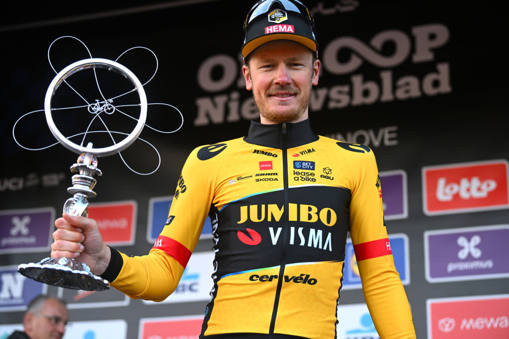  NINOVE BELGIUM  FEBRUARY 25 Dylan Van Baarle of The Netherlands and Team JumboVisma celebrates at podium as race winner during the 78th Omloop Het Nieuwsblad Elite 2023 Mens Elite a 2073km one day race from Ghent to Ninove  OHN23  on February 25 2023 in Ninove Belgium Photo by Luc ClaessenGetty Images 