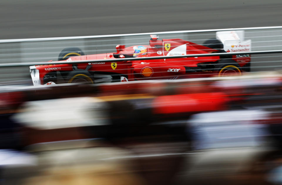 MONTREAL, CANADA - JUNE 08: Fernando Alonso of Spain and Ferrari drives during practice for the Canadian Formula One Grand Prix at the Circuit Gilles Villeneuve on June 8, 2012 in Montreal, Canada. (Photo by Paul Gilham/Getty Images)