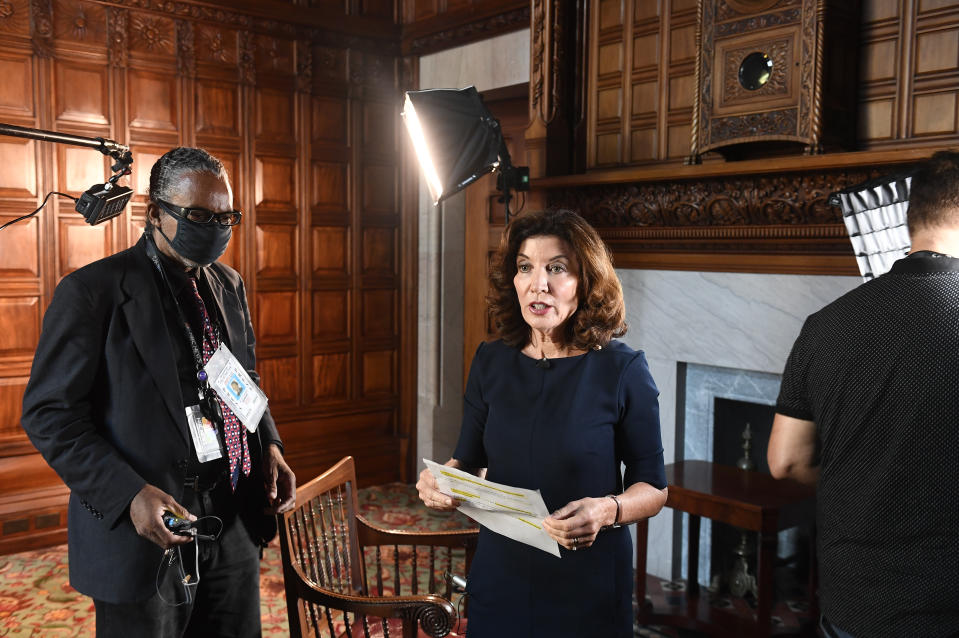 New York Lt. Governor Kathy Hochul speaks with a news crew before taking part in a remote interview on NBC's TODAY with Savannah Guthrie from her office at the state Capitol Thursday, Aug. 12, 2021, in Albany, N.Y. (AP Photo/Hans Pennink)