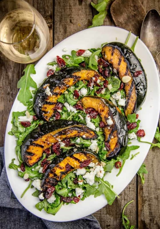 <p>Vindulge</p><p>Grilling acorn squash is super easy, and adds incredible flavor to this easy fall salad. Serve as a side or enjoy it as a dinner salad. </p><p><strong>Get the recipe: <a href="https://www.vindulge.com/grilled-acorn-squash-salad/#search" rel="nofollow noopener" target="_blank" data-ylk="slk:Grilled Acorn Squash Salad;elm:context_link;itc:0;sec:content-canvas" class="link ">Grilled Acorn Squash Salad</a></strong></p>