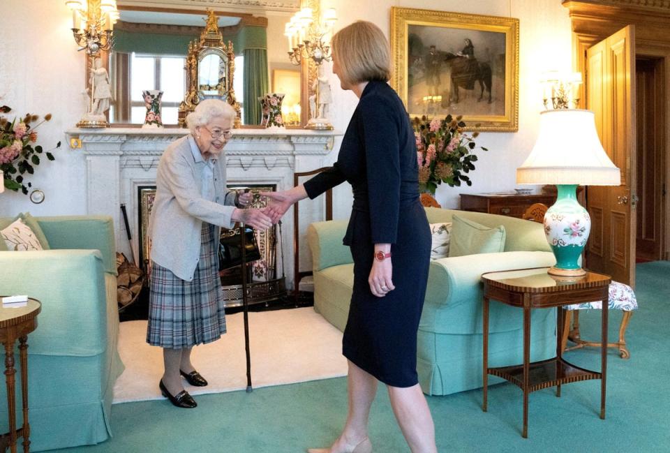 Queen Elizabeth welcomes Liz Truss during an audience at Balmoral Castle, Scotland, on 6 September (Reuters)