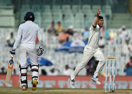 Cricket - India v England - Fifth Test cricket match - M A Chidambaram Stadium, Chennai, India - 20/12/16. India's Umesh Yadav celebrates the dismissal of England's Adil Rashid. REUTERS/Danish Siddiqui