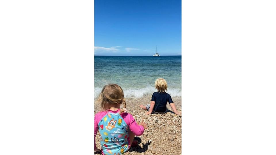 Carrie shares a photo of her daughter Romy and son Wilfred looking out into the ocean