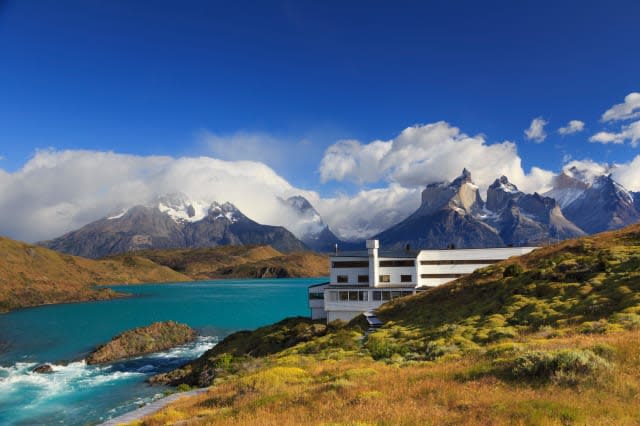 Chile, Patagonia, Torres del Paine National Park (UNESCO Site), Cuernos del Paine peaks and Luxury Hotel Explora