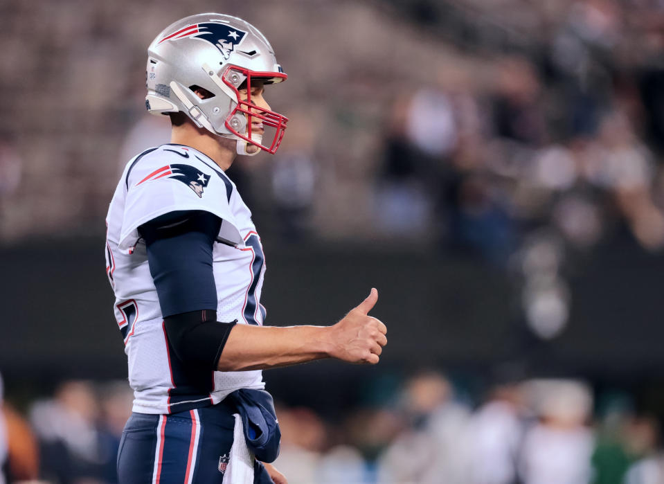 EAST RUTHERFORD, NJ - OCTOBER 21: New England Patriots Quarterback Tom Brady (12) gives a thumbs up prior to the National Football League game between the New England Patriots and the New York Jets on October 21, 2019 at MetLife Stadium in East Rutherford, NJ. (Photo by Joshua Sarner/Icon Sportswire via Getty Images)