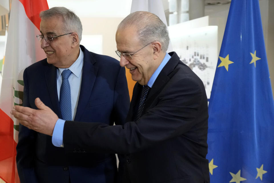 Cyprus' foreign minister Ioannis Kasoulides, right, welcomes his Lebanese counterpart Abdallah Bou Habib following their meeting at the foreign ministry house in Nicosia, Cyprus, Friday, April 15, 2022. Bou Habib is in Cyprus for one-day visit. (AP Photo/Petros Karadjias)