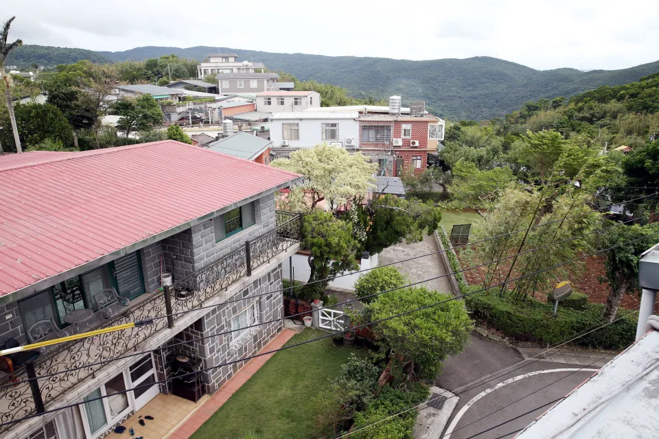 陽明山保護區變更住宅區開發要闖關，住6-6案雖挫敗須重做環評，但海拔略低的住6-4和6-5案，則在悄悄進行中。圖為預定開發的範圍內住家。圖／聯合報系資料照片