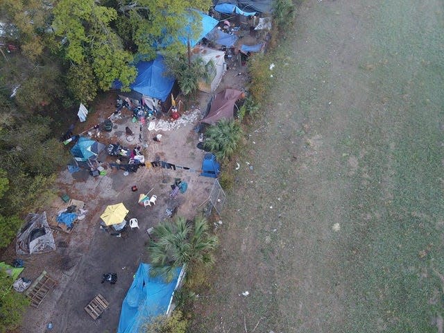 Drone image of homeless campers behind businesses on the 4300 Block of N. Palafox. Business owners say the transients bring an array of problems.