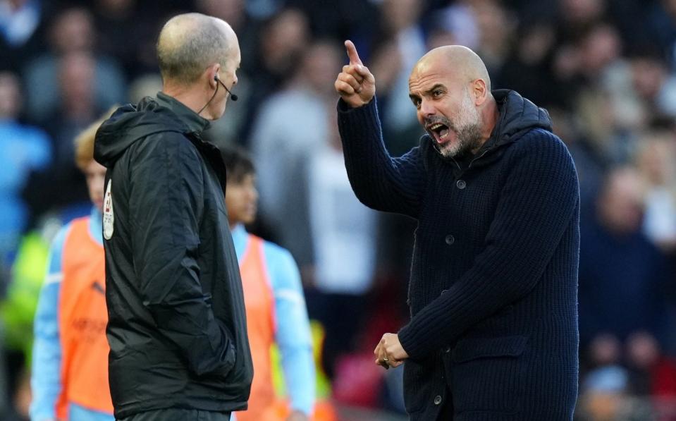 Pep Guardiola remonstrates with the fourth official - GETTY IMAGES