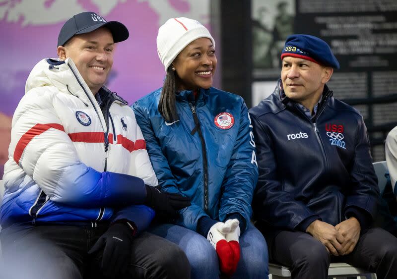 Gov. Spencer Cox sits with Vonetta Flowers, 2002 Olympic bobsled gold medalist, and Derek Parra, 2002 Olympic speedskating gold medalist, at a lighting ceremony for the Olympic Cauldron, marking the 20-year anniversary of the Salt Lake 2002 Olympics opening ceremony at Rice-Eccles Stadium at the University of Utah in Salt Lake City on Tuesday, Feb. 8, 2022. | Scott G Winterton, Deseret News