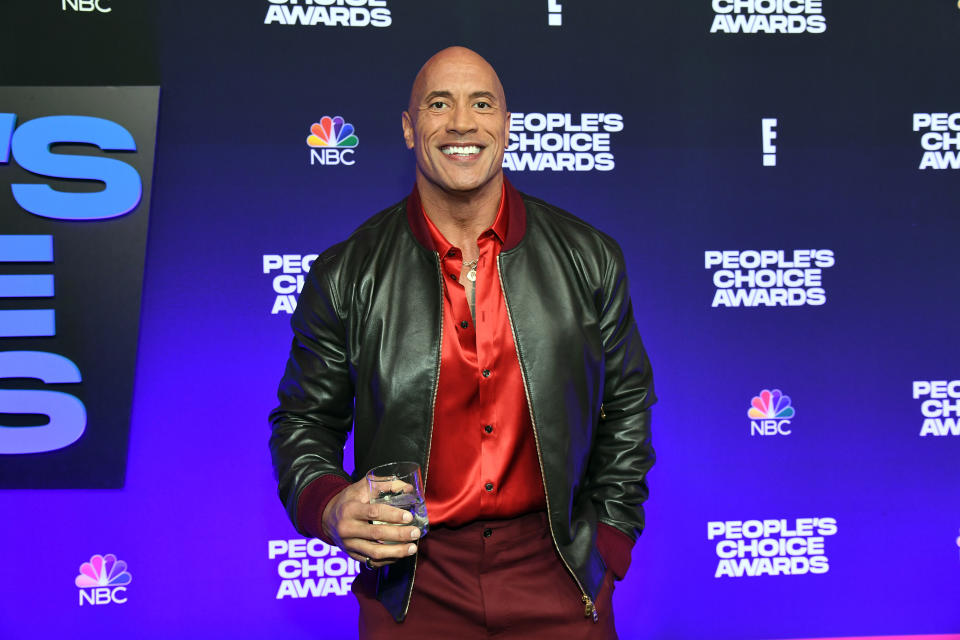 SANTA MONICA, CALIFORNIA - DECEMBER 07: Dwayne Johnson attends the People's Choice Awards at Barker Hangar on December 07, 2021 in Santa Monica, California. (Photo by Kevin Mazur/Getty Images for DJ)