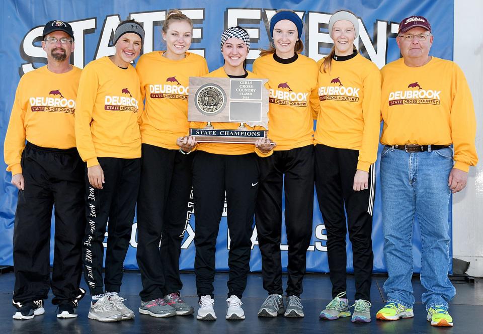 Deubrook Area High School’s girls claimed their first ever Class B championship during the 2018 State High School Cross Country Meet at Yankton Trail Park in Sioux Falls. Team members included, from left, assistant coach Paul Ekern, Ellie Olsen, Shaylee DeBeer, Josie Olsen, Mattie Nepodal, Andrea Vandermeer and head coach Don Ray.