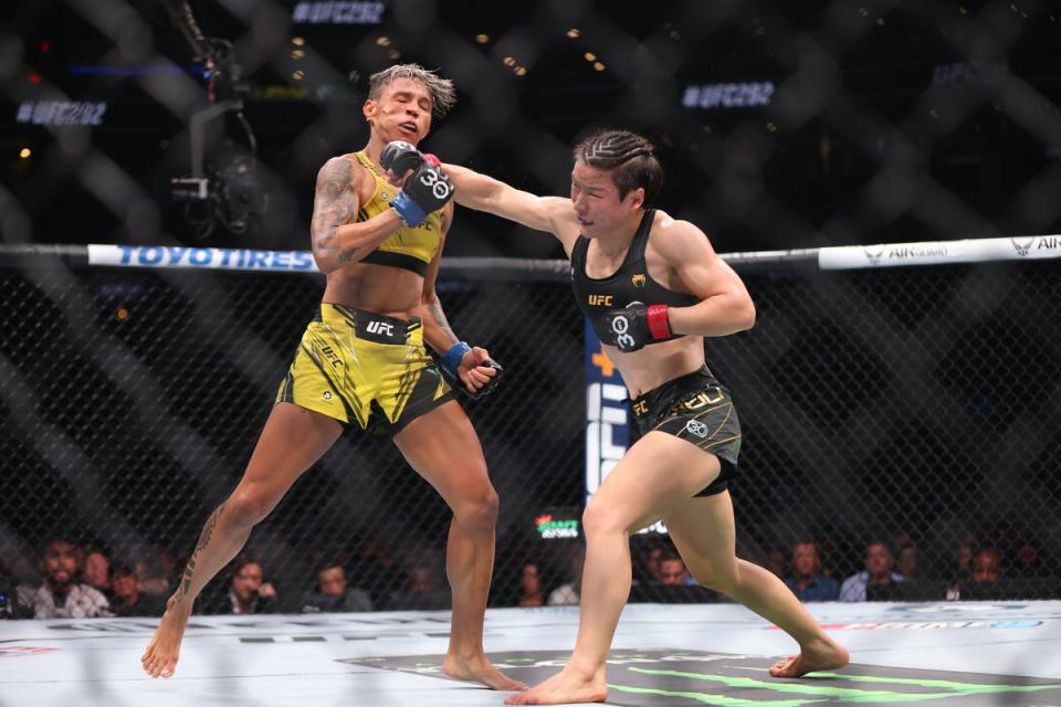 Zhang Weili, right, dominated Amanda Lemos to retain the strawweight title (Getty Images)