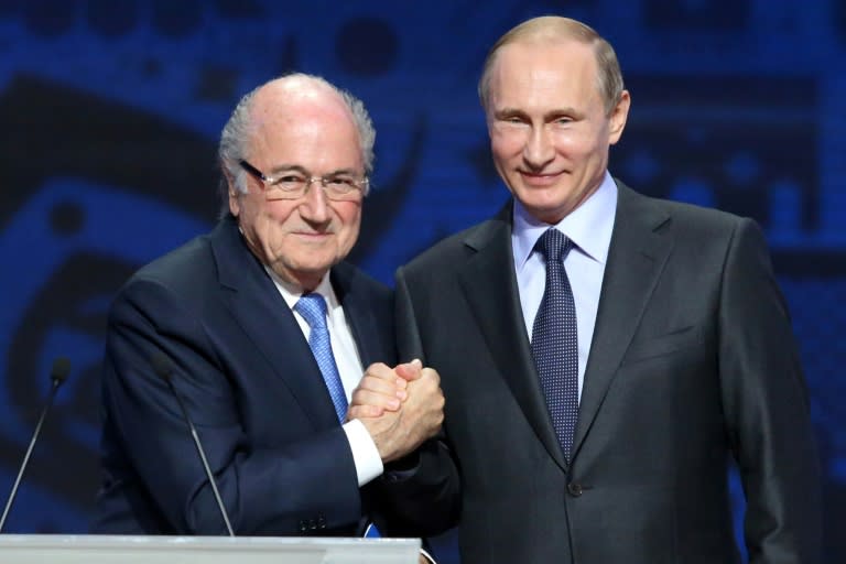 Then FIFA president Sepp Blatter with Russian President Vladimir Putin ahead of the preliminary draw for the 2018 World Cup qualifiers in Saint Petersburg on July 25, 2015