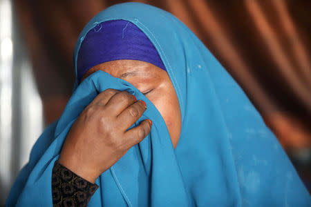 Fahmo Mantan Warsame reacts during a Reuters interview inside her home in Mogadishu, Somalia February 21, 2018. REUTERS/Feisal Omar