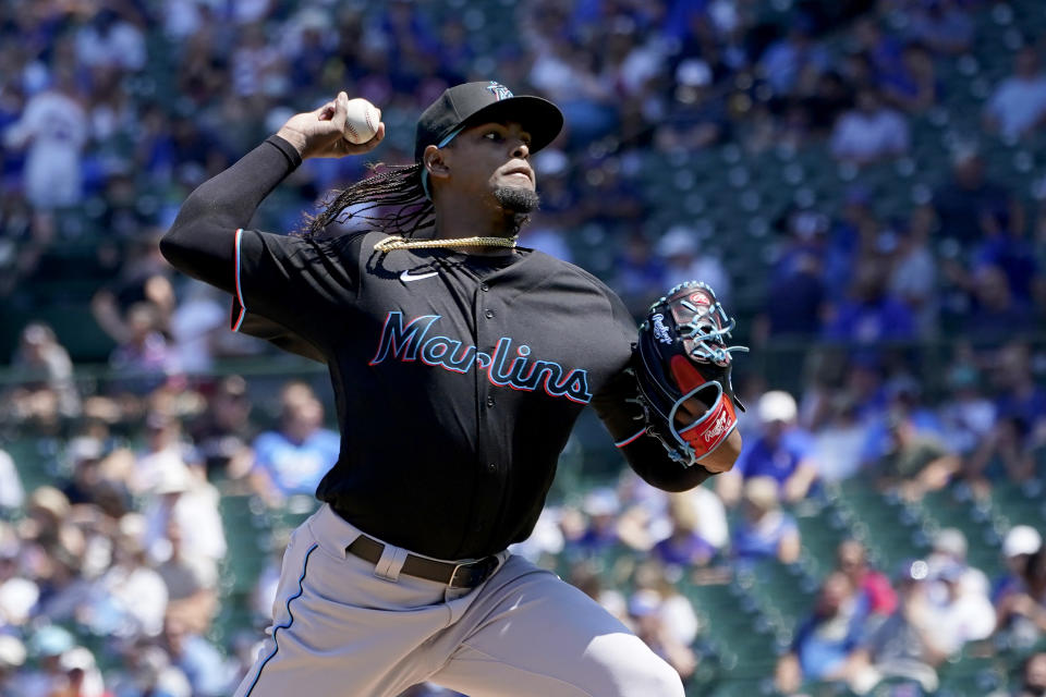 Miami Marlins starting pitcher Edward Cabrera delivers during the first inning of a baseball game against the Chicago Cubs Friday, Aug. 5, 2022, in Chicago. (AP Photo/Charles Rex Arbogast)