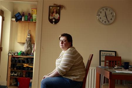 Catherine Droogan poses for a photograph in the kitchen of her house in the Northern Ireland town of Omagh February 27, 2014. REUTERS/Cathal McNaughton