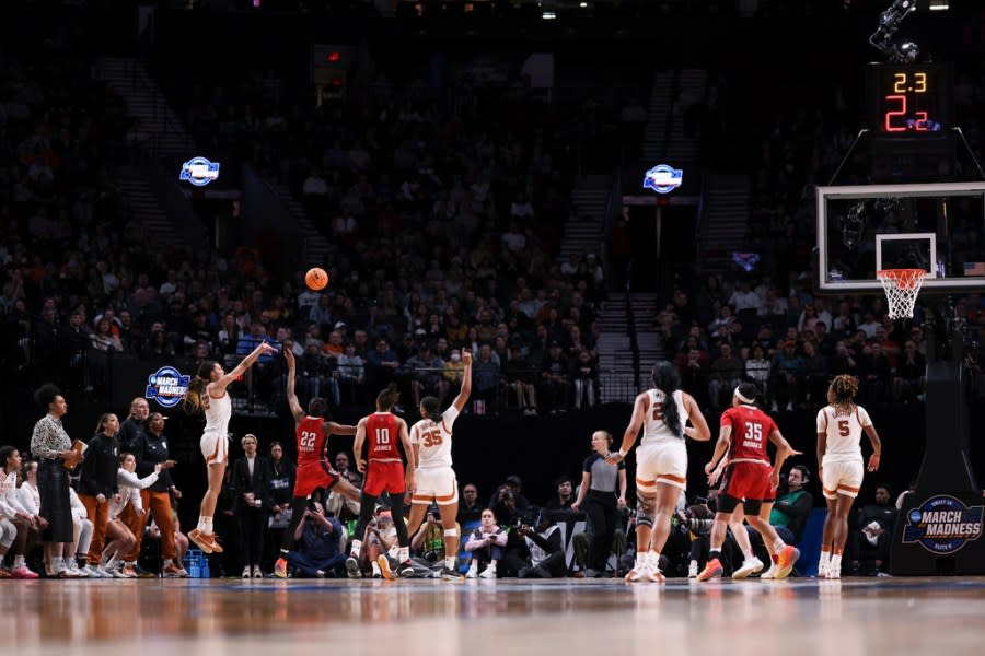 Texas guard Ndjakalenga Mwenentanda (32) shoots against North Carolina State during the second half of an Elite Eight college basketball game in the women’s NCAA Tournament, Sunday, March 31, 2024, in Portland, Ore. (AP Photo/Howard Lao)