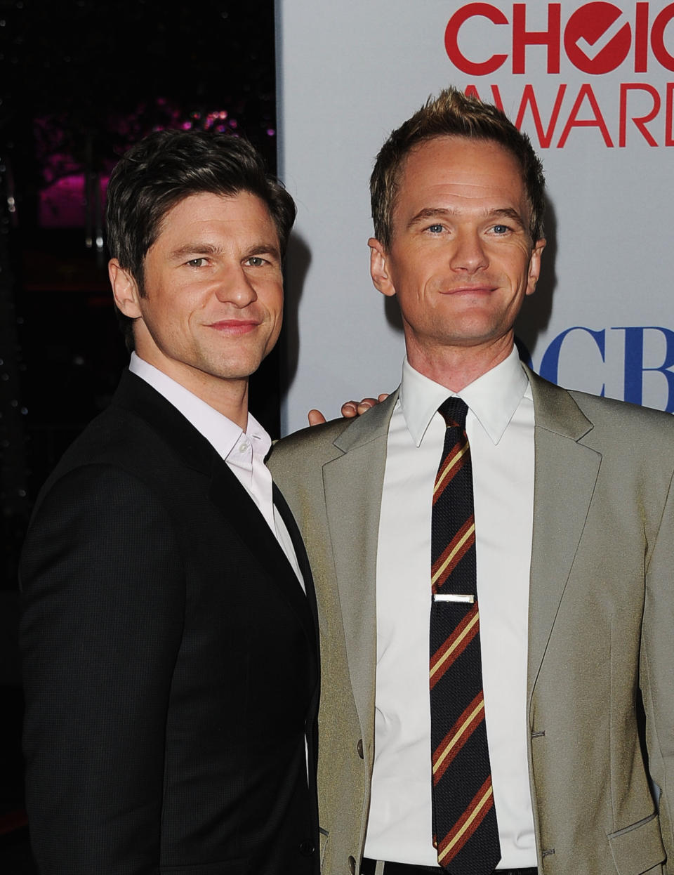 LOS ANGELES, CA - JANUARY 11: Actor Neil Patrick Harris (R) and David Burtka arrive at the 2012 People's Choice Awards held at Nokia Theatre L.A. Live on January 11, 2012 in Los Angeles, California. (Photo by Jason Merritt/Getty Images)