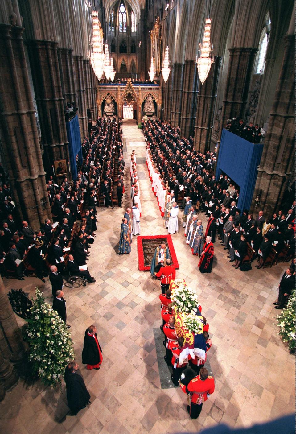 FILE - This Sept. 6, 1997 file photo shows the casket containing the body of Diana, Princess of Wales, as it is carried into Westminster Abbey by soldiers of the Welsh Guards, during funeral ceremonies in London. Sony Electronics and the Nielsen television research company collaborated on a survey ranking TV's most memorable moments. Other TV events include, the Sept. 11 attacks in 2001, Hurricane Katrina in 2005, the O.J. Simpson murder trial verdict in 1995 and the death of Osama bin Laden in 2011. (AP Photo/Peter Dejong/POOL)