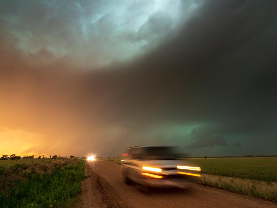 Stunning stormy skies with a rush of traffic trying to escape a severe hail storm Kansas, USA