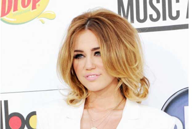 <b>May 2012</b> <br>Miley channels a Brigitte Bardot bob at the 2012 Billboard Music Awards.