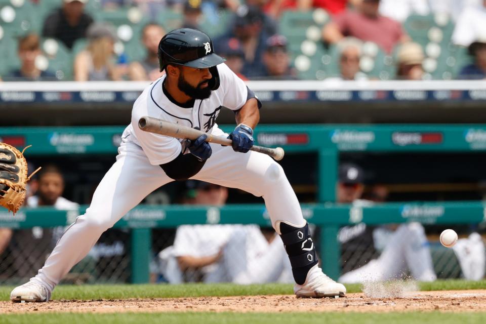 Detroit Tigers center fielder Derek Hill (54) bunt for a single in the third inning against the Minnesota Twins at Comerica Park on July 18, 2021.