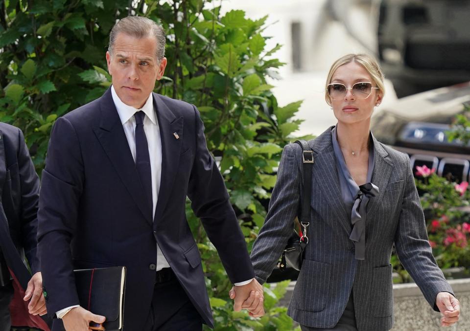 Hunter Biden, son of U.S. President Joe Biden, arrives at the federal court with his wife Melissa Cohen Biden, on the opening day of his trial on criminal gun charges (REUTERS)