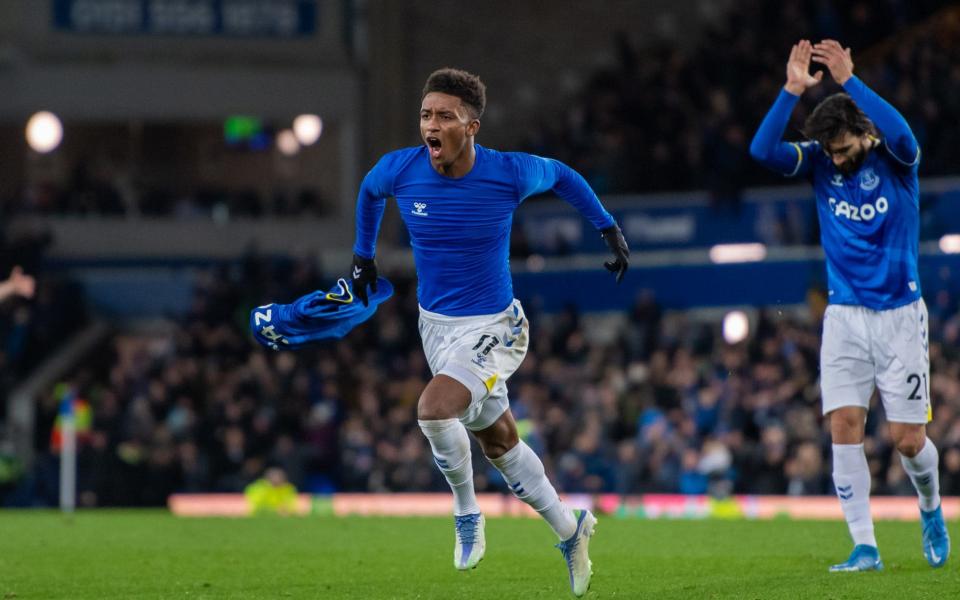 Demarai Gray of Everton celebrates scoring his teams second goal during the Premier League match between Everton and Arsenal at Goodison Park on December 06, 2021 in Liverpool, England - GETTY IMAGES