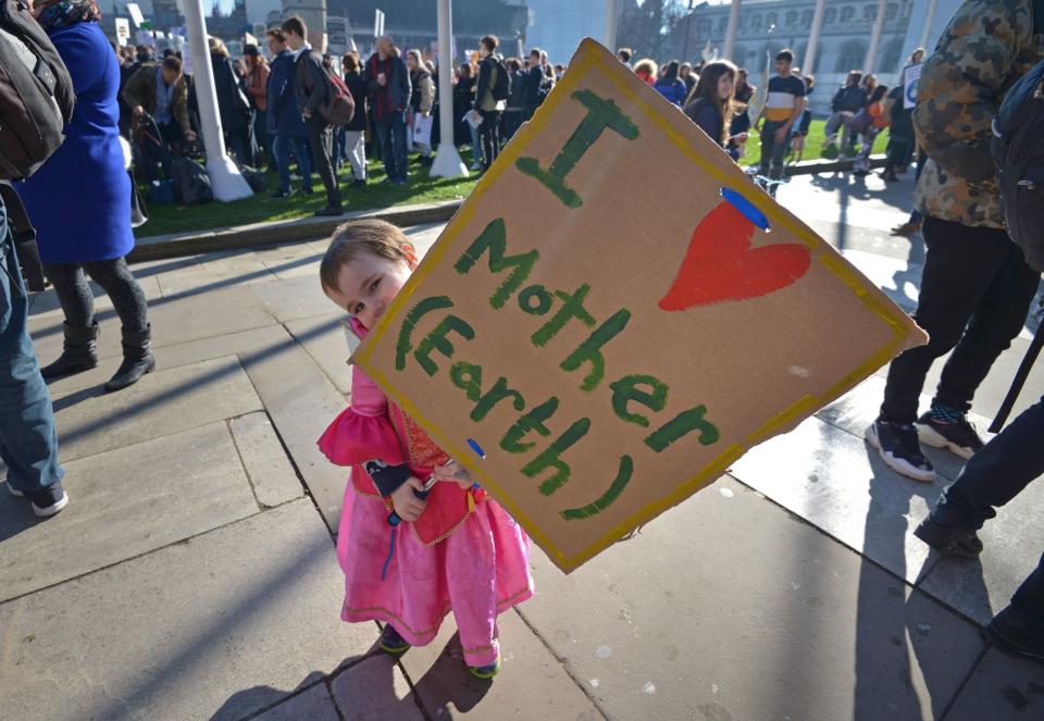 Three year old Violet Wicks from London during a climate change protest on Parliament Square in Westminster, London. (Nick Ansell/PA Wire)