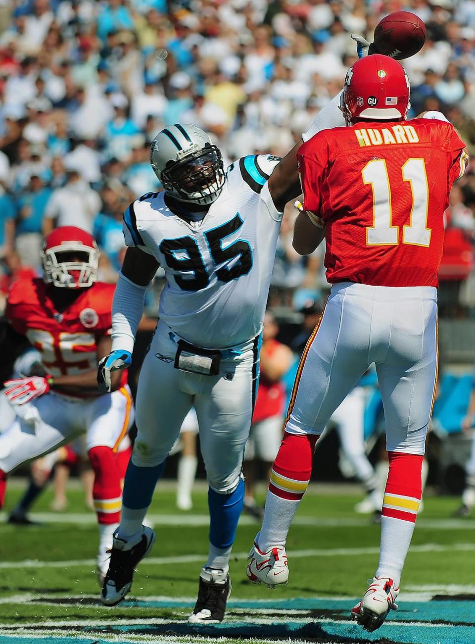 Carolina Panthers (95) defensive end Charles Johnson knocks down a pass by Kansas City Chiefs quarterback Damon Huard (11) during a 2008 win for the Panthers. Johnson ended his career second all-time on the team’s sack list, behind only Julius Peppers.