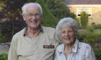 Andy Murray's grandparents Roy and Shirley Erskine celebrate at their home in Dunblane, Scotland, after Murray beat Novak Djokovic to win the Wimbledon final.