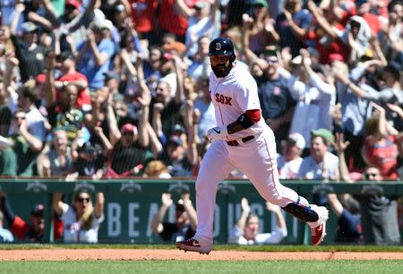 FILE PHOTO: May 11, 2019; Boston, MA, USA; Boston Red Sox catcher Sandy Leon (3) rounds the bases after hitting a three run home run during the third inning against the Seattle Mariners at Fenway Park. Bob DeChiara-USA TODAY Sports