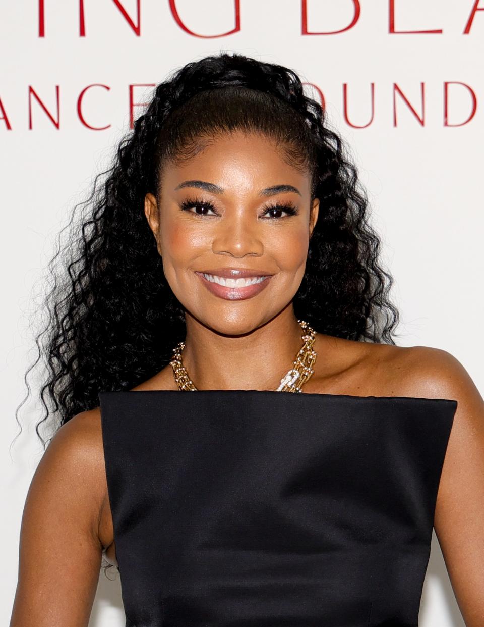 <h1 class="title">Gabrielle Union Curly Ponytail </h1><cite class="credit">Getty Images</cite>